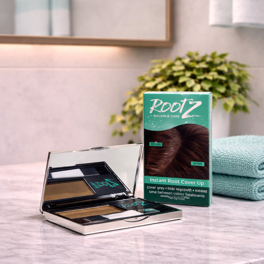 Rootz instant root cover up hair loss concealer product with packaging on a bathroom counter.